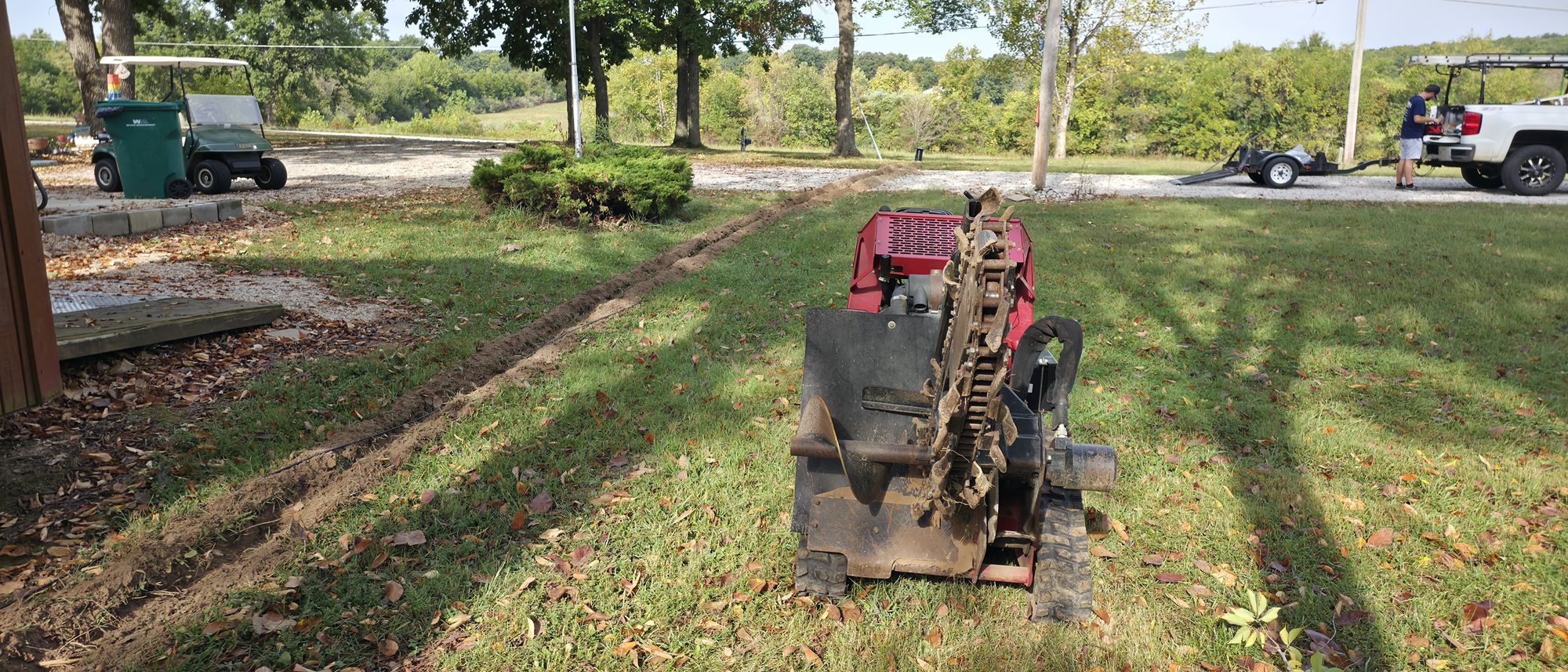 TownLink trenching a new underground service path at a rural property